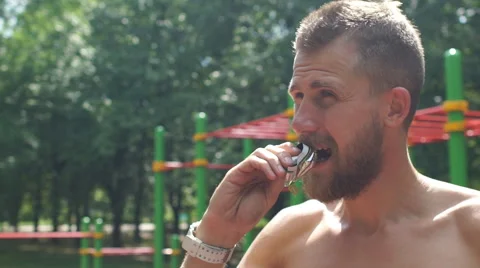 Fitness Man Eating A Energy Bar Of Chocolate Stock Footage