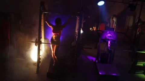 Fitness Model Posing in Smoke Stock Footage 32398989