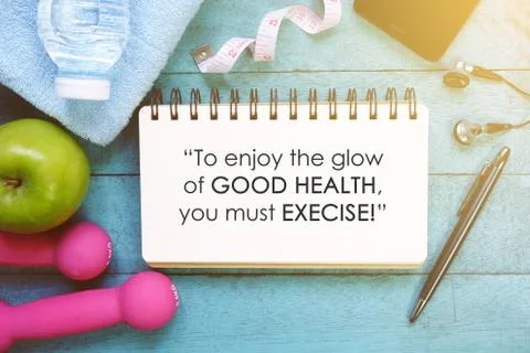 Fitness Quotes on open notebook. Stock Photos