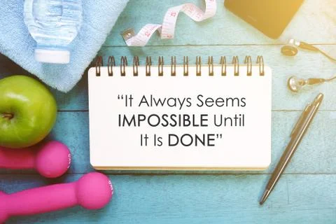 Fitness Quotes on open notebook. Stock Photos