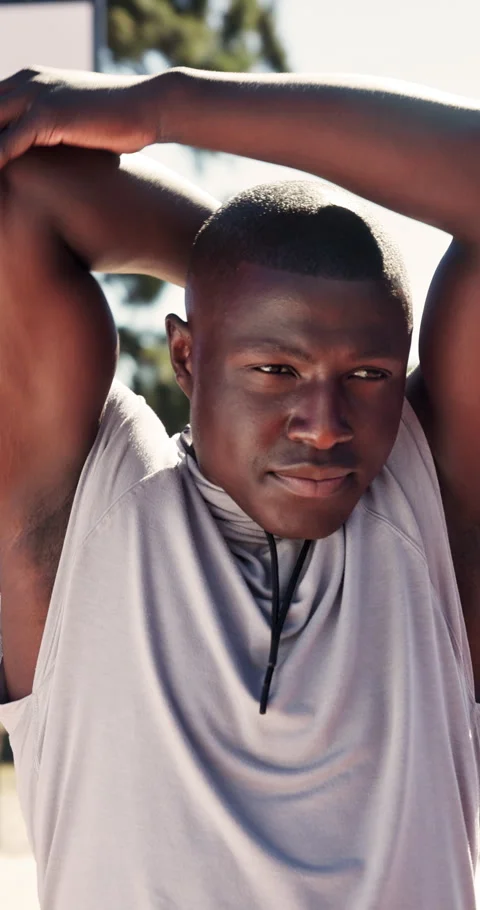 Fitness, routine or man on basketball court with stretching, arm mobility or Stock Footage 340880153