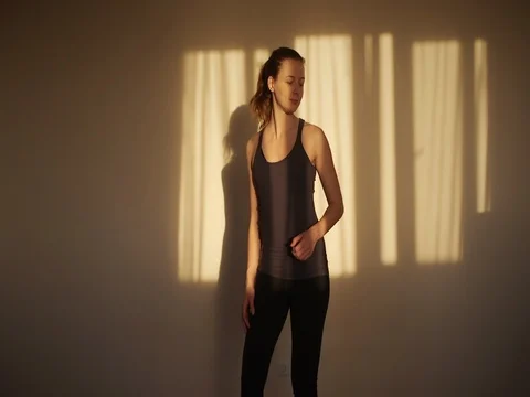 Fitness, sport, dance and lifestyle concept - girl smiling and dancing at sunset Stock Footage