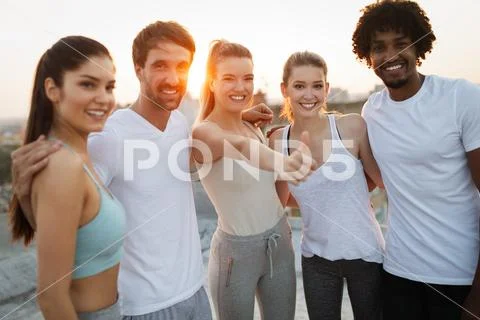 Fitness, sport, friendship and healthy lifestyle concept - group of happy sporty Stock Photos