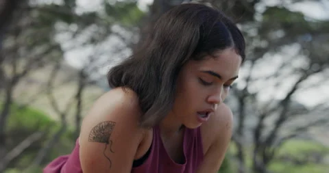 Fitness, stop or runner in nature with smart watch, progress track or break in Stock Footage 330538457
