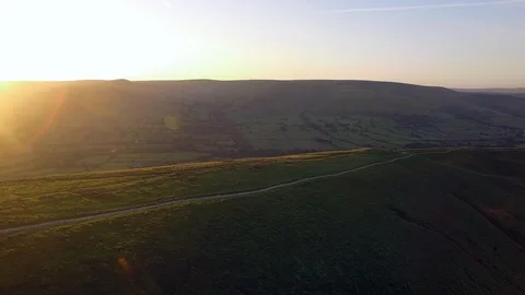 Fitness trail runner, running man, run along ridge at sunset over scenic view  Stock Footage 85658667