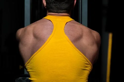 Fitness trainer doing exercise for back Stock Photos