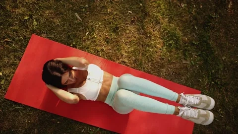 Fitness trainer or instructor wearing sportswear doing exercises to stay fit Stock-Footage 234777388