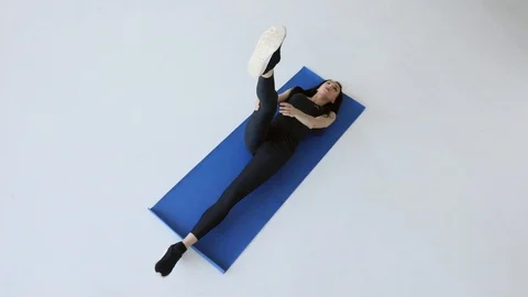 Fitness tutorials. Above view at the athletic female trainer doing the star Stock Footage 85570645