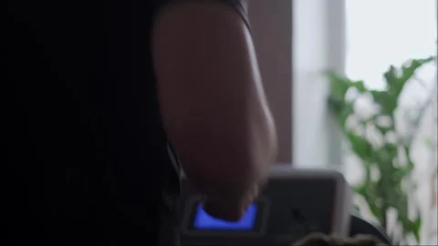 Fitness without limits: a treadmill allows you to train anytime and anywhere. Stock Footage 305570020