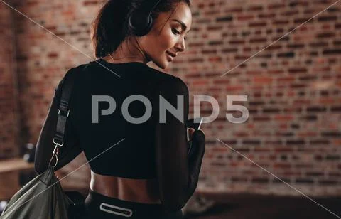 Fitness woman at health club Stock Photos