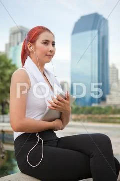 Fitness woman listening to music Stock Photos
