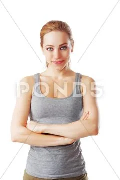 Fitness woman looking to the camera with arms crossed Stock Photos