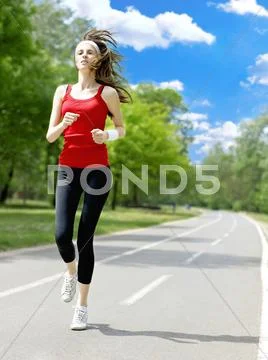 Fitness woman running Stock Photos