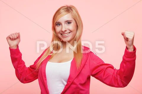 Fitness woman showing energy flexing biceps Stock Photos