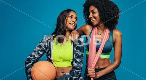 Fitness women relaxing after workout Stock Photos