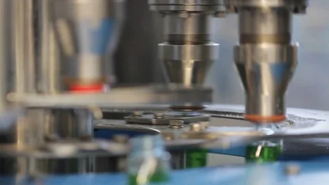 Fitting lids on bottles Stock Footage 77052769