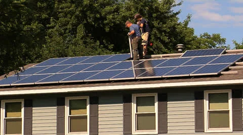 Fitting Solar Panel into place Stock Footage 25658531