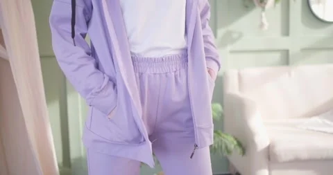 Fitting a tracksuit in a bright room Stock Footage 267835270