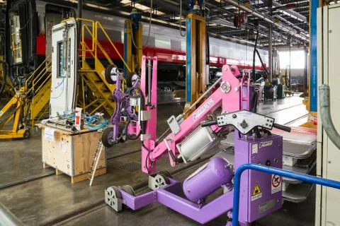 Fitting windows machine in a workshop major repairs Stock Photos