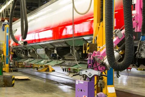 Fitting windows on railway wagon. Stock Photos