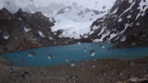 Fitz Roy mnt in bad weather. Shaky, with rain drops on filter glass. Stock Footage 103261344