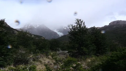Fitz Roy mnt in clouds (wind, rain, shaky). Video stock 103261341
