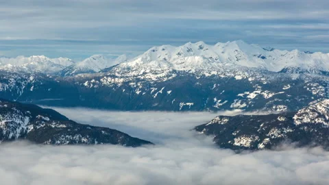 Fitzsimmons Range and Cloud Inversion from Blackcomb Mountain Timelapse Stock Footage 156552690