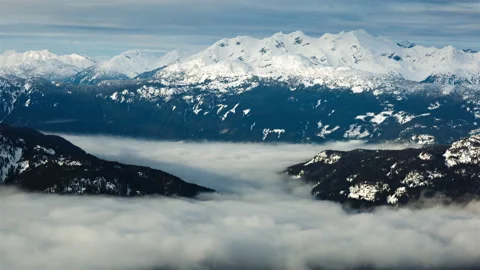Fitzsimmons Range Mountains and Cloud Inversion Timelapse Stock Footage 147423196