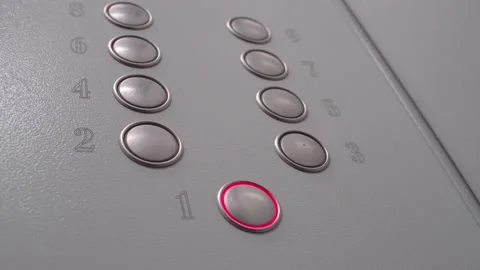 The five "5" floor button lights up red on the dial in the Elevator. Video stock 141853051