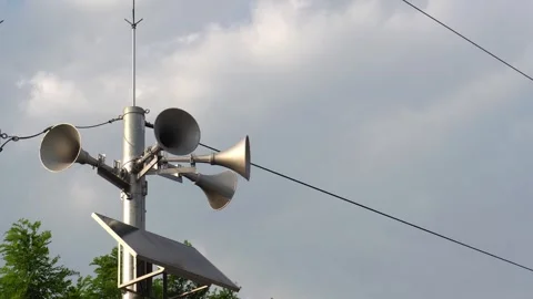 Five amplification megaphones with moving clouds Stock Footage 290884921