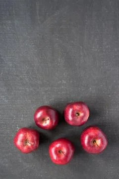 Five apples on painted board 写真素材