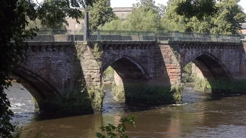 The five arch Roman bridge across the River Dee, Chester, England Stock Footage 126531280