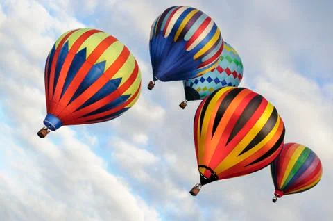 Five balloons in flight Stock Photos
