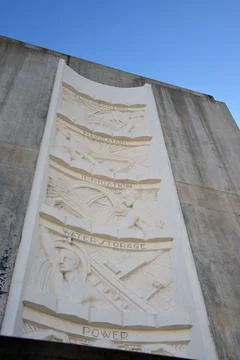 The five bas-reliefs on the Nevada elevator tower, done in concrete, show the Stock Photos