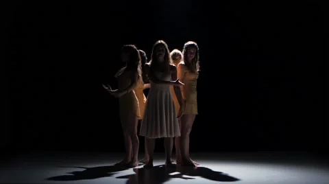 Five beautiful girls continue dancing modern contemporary dance, on black Video stock 61307147