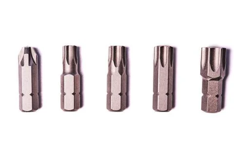 Five bits for screwdriver isolated on white background Stock Photos