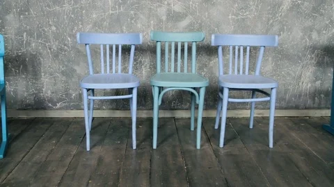 Five Blue chairs by itself placed in a row in stop motion Stock Footage 73937758