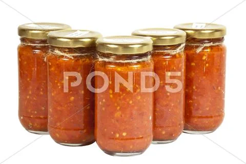 Five bottles of chilli preserve known as mazavaroo Stock Photos