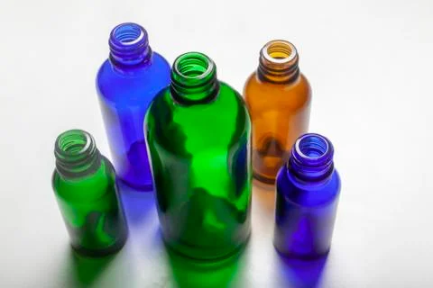 Five bottles on white background Stock Photos