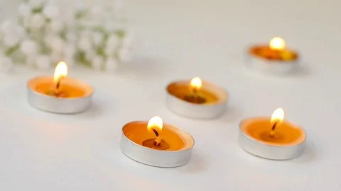 Five burning candles on white background. Relaxation and aromatherapy concept Stock Footage 119958943