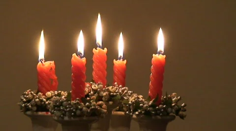 Five candles in ceramic candle holder two, close-up Stock Footage 63328