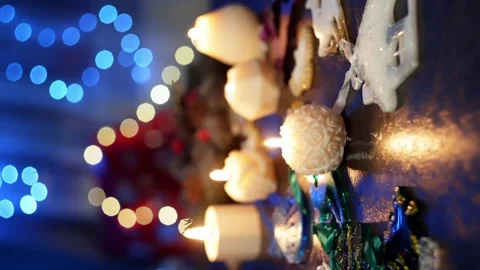 Five candles of different shapes made of soy wax fill the room with warmth. Stock Footage 260929126