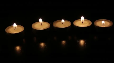 Five candles with a little wind on light Video stock 46583774