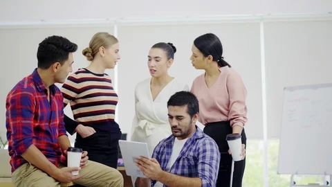 Five casual creative startup business have video conference with tablet Stock Footage 96321152