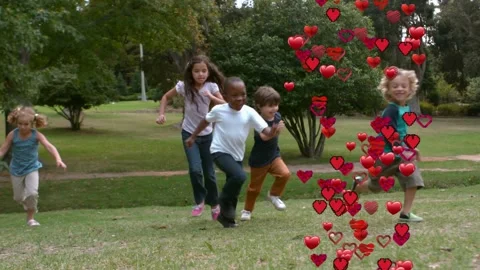 Five children starting downhill in park, promoting health as hearts rise, Stock Footage 323147576