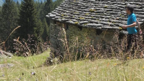 Five clips of runner and biker on mountain path Video stock 114174326