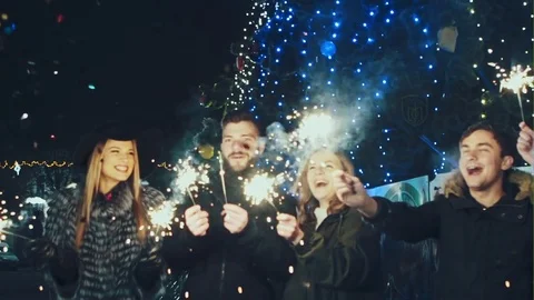 Five close friends celebrating New Year outdoors Stockbeeldmateriaal 71096766