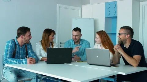 Five co-workers in office Stock Footage 93863674