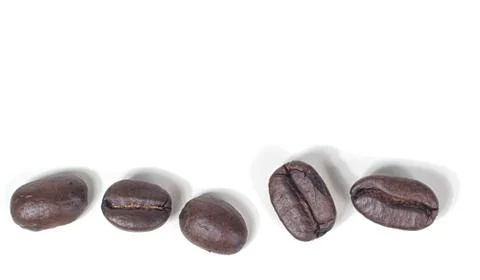 Five coffee beans dark roasted isolated on white background 스톡 사진