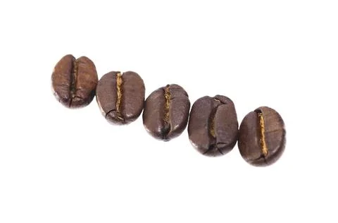 Five coffee beans isolated on white Stock Photos